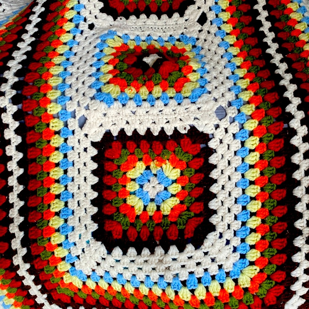 Crochet lap blanket. Multi color. 32” X 62”